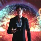 The Illusive Man holds a cigarette.