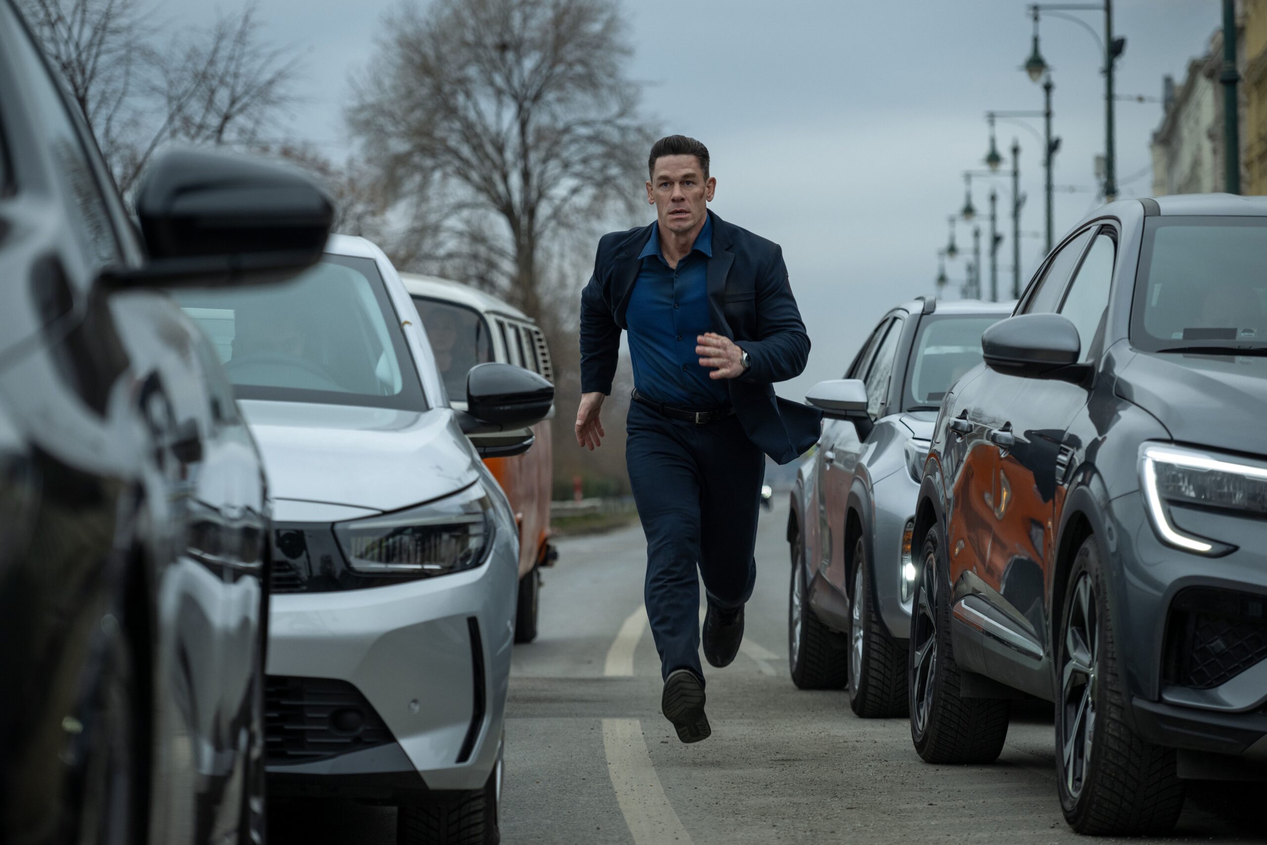 John Cena runs in a promotional image for Matchbox: The Movie