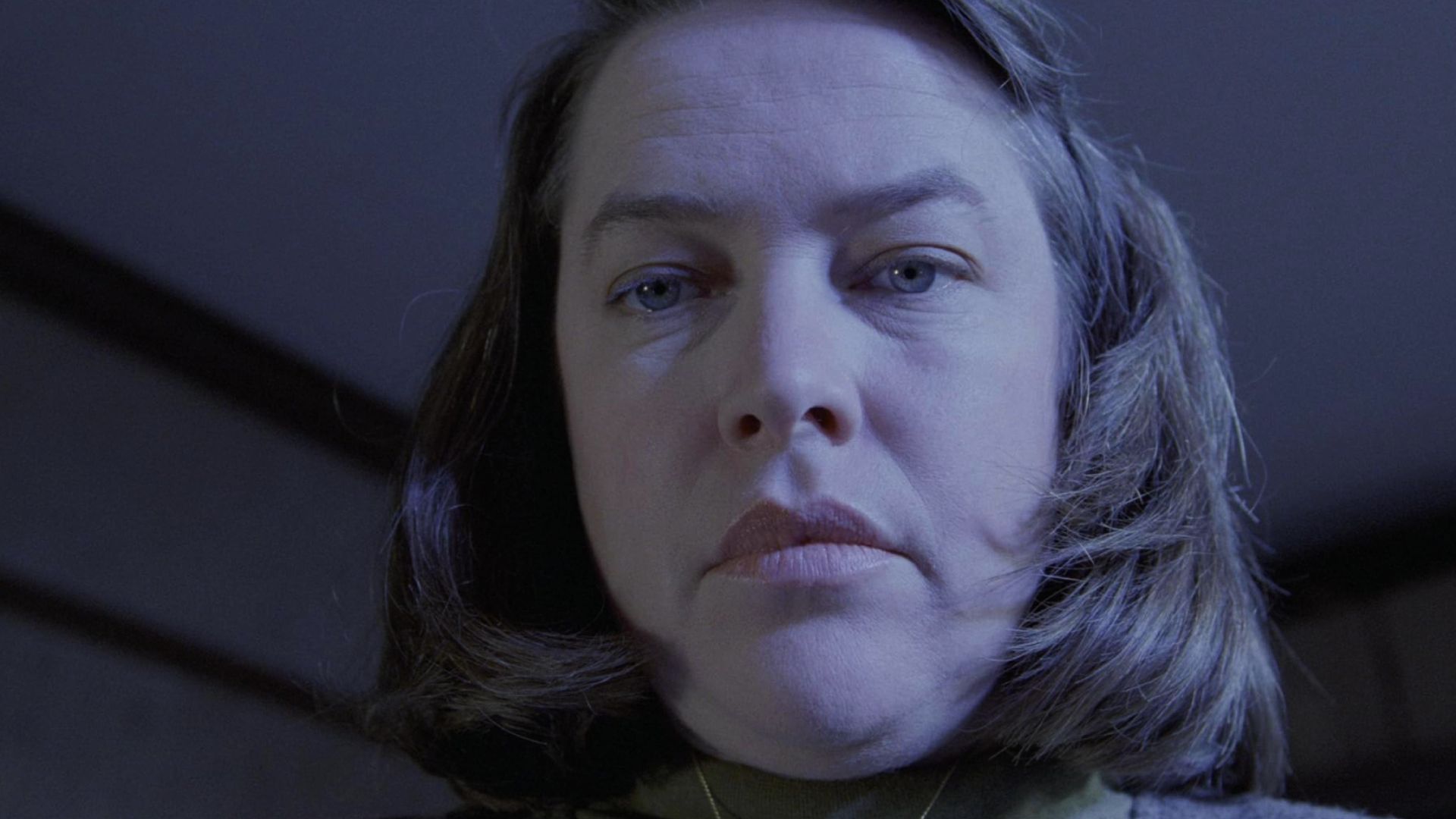 A close-up shot of Kathy Bates as Annie Wilkes.
