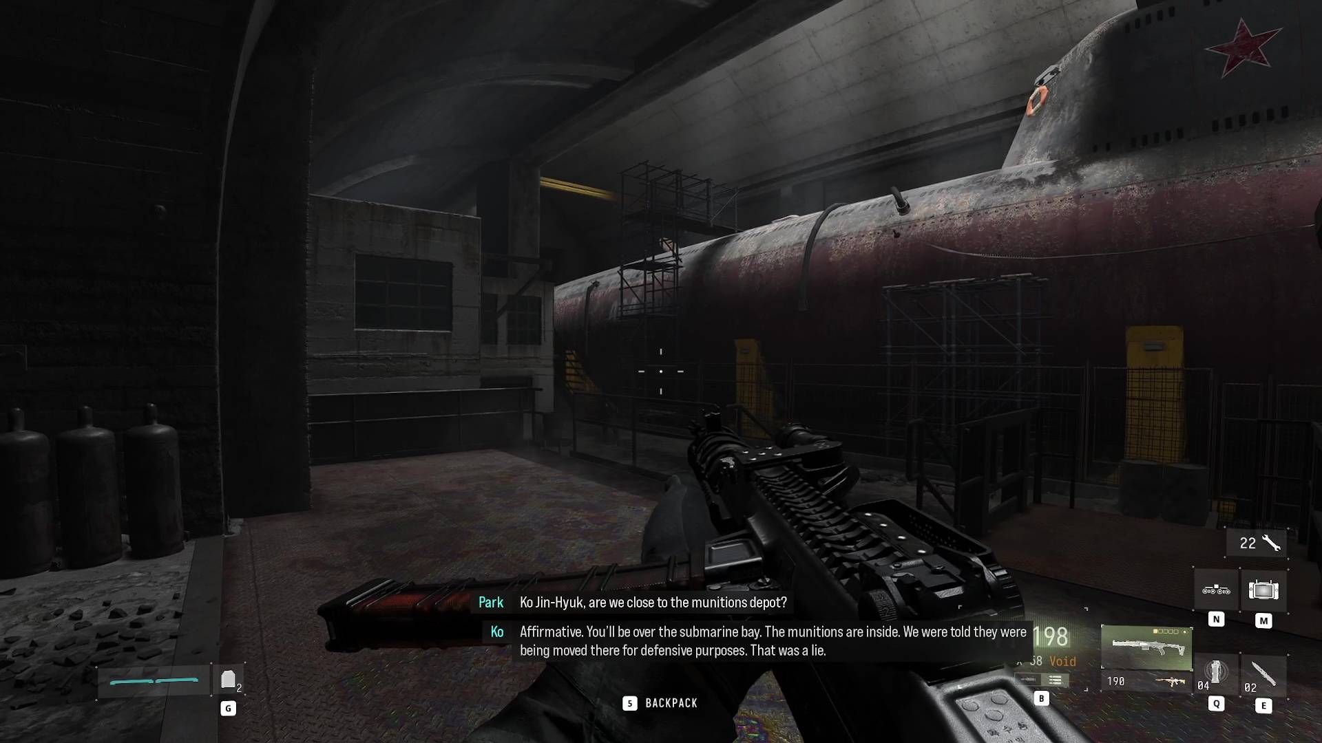 A Modern Warfare 4 screenshot showing a huge submarine in an abandoned bunker.