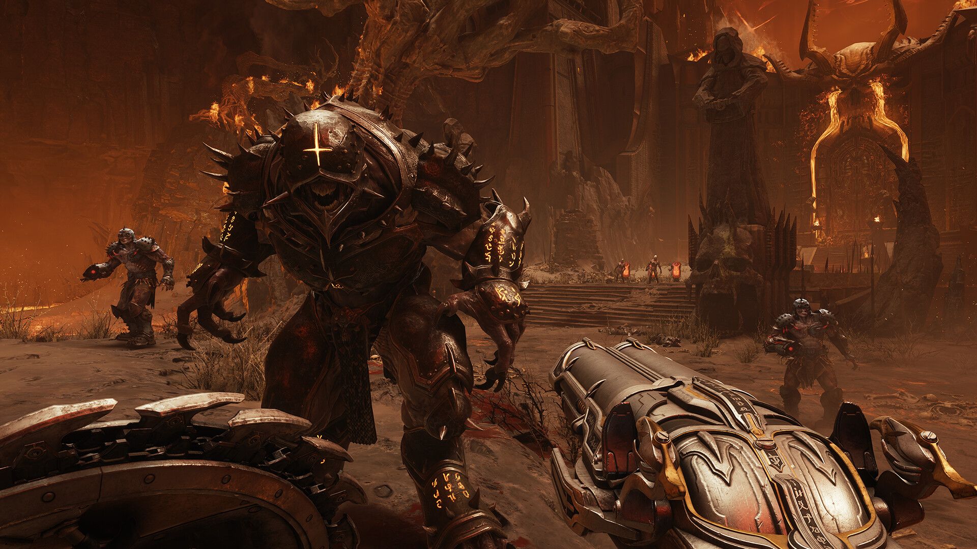 A first-person screenshot of the Doom Slayer from Doom: The Dark Ages wielding his shield in his left hand and a huge gun in his right hand as an armored demon approaches him