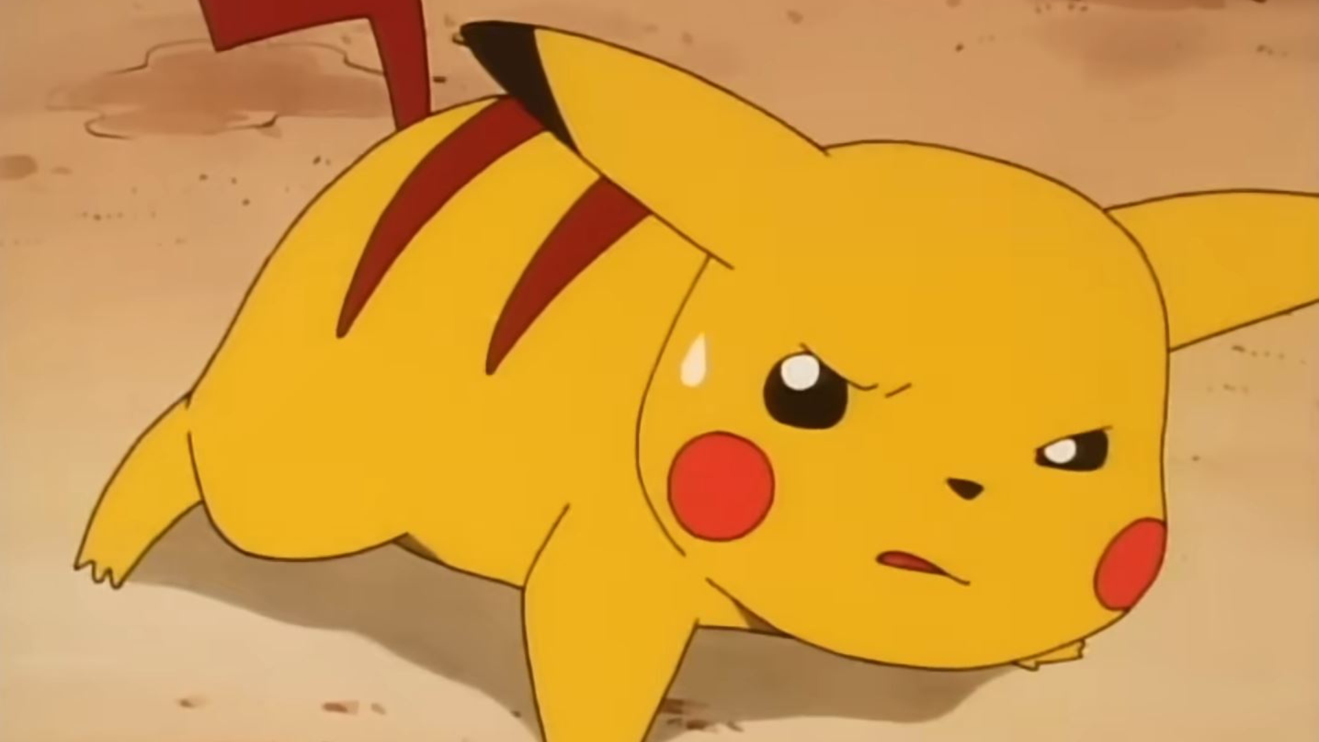 Pikachu from the Pokemon anime as he is hurt on the ground.